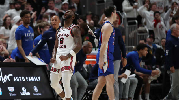 Feb 12, 2024; Lubbock, Texas, USA; Texas Tech Red Raiders guard Joe Toussaint (6) reacts after a shot against the Kansas Jayhawks in the first half at United Supermarkets Arena.